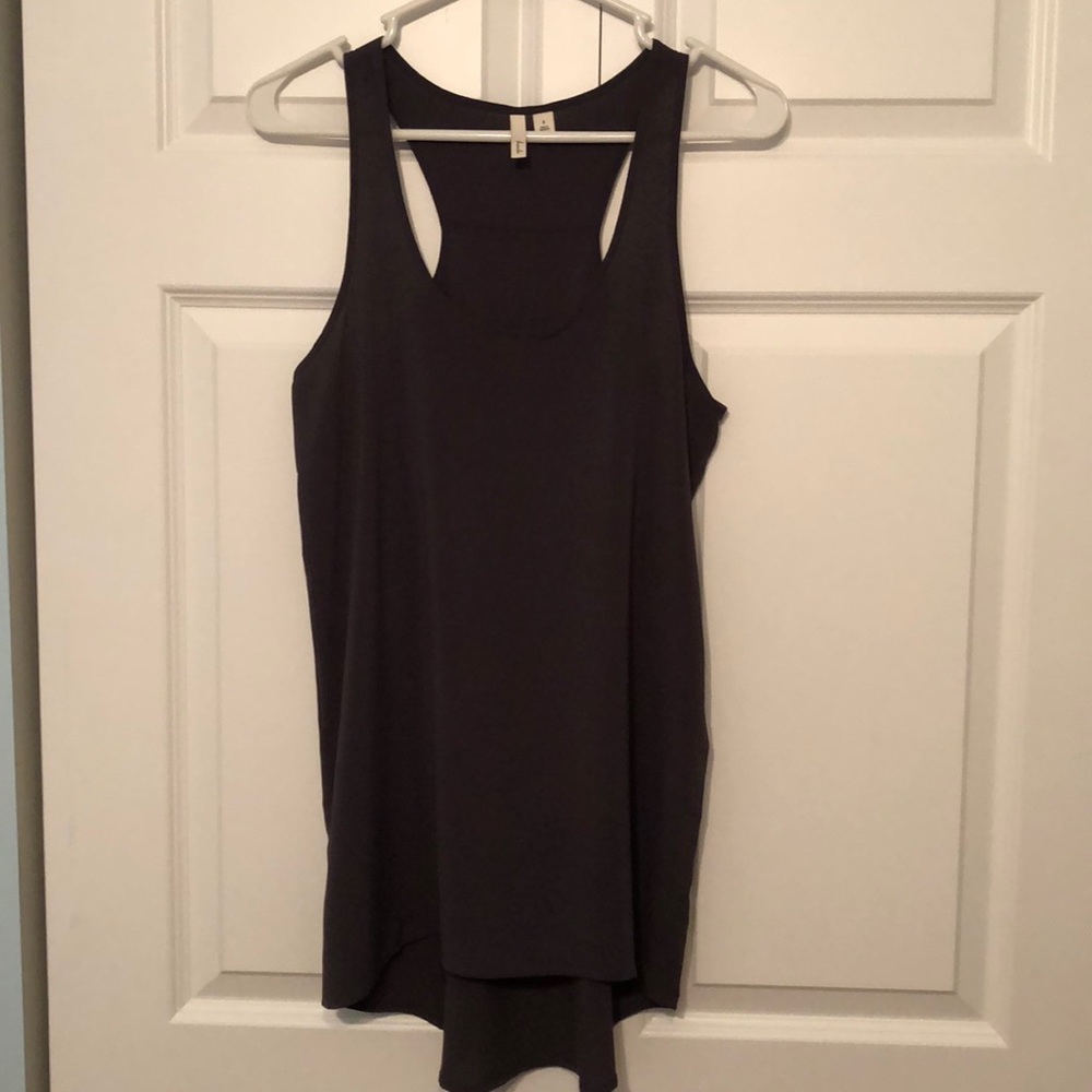 Sleeveless racerback blouse.